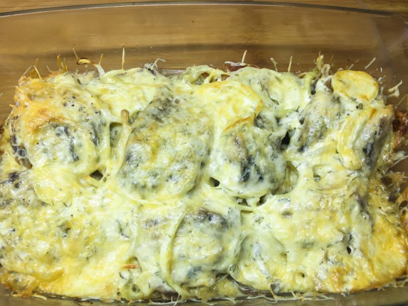 baked crucian with sour cream and cheese