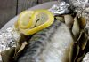 Oven mackerel with lemon in foil in the oven