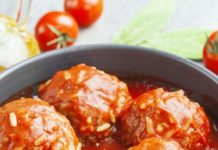 Chicken meatballs with rice in tomato sauce